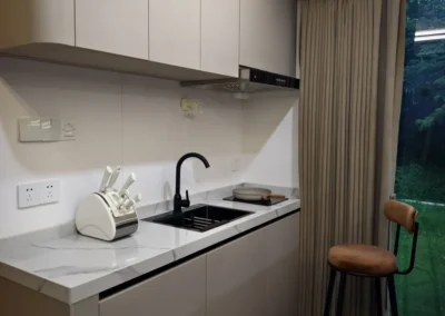 BAUSTADT Capsule House Model D8 compact modern kitchen interior